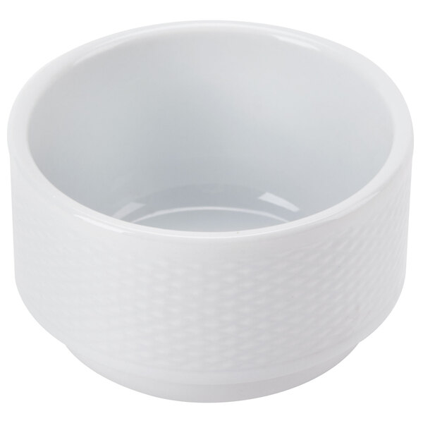 A close up of a CAC Boston white porcelain nappie bowl with a textured pattern.