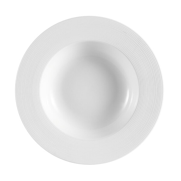 A CAC porcelain pasta bowl with a white center and a black circle on the rim.
