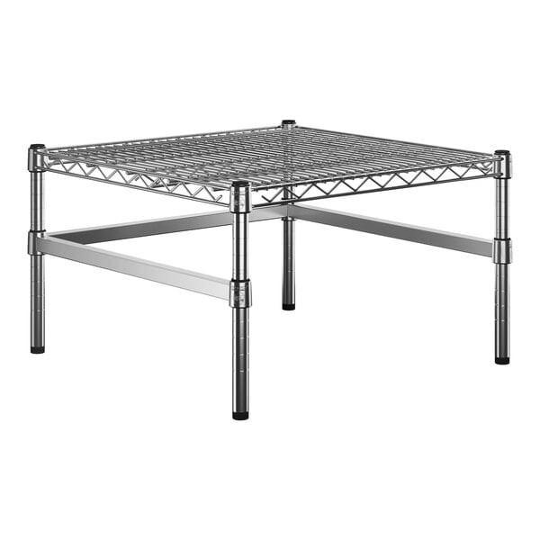 A Regency chrome plated metal wire shelf with two legs.