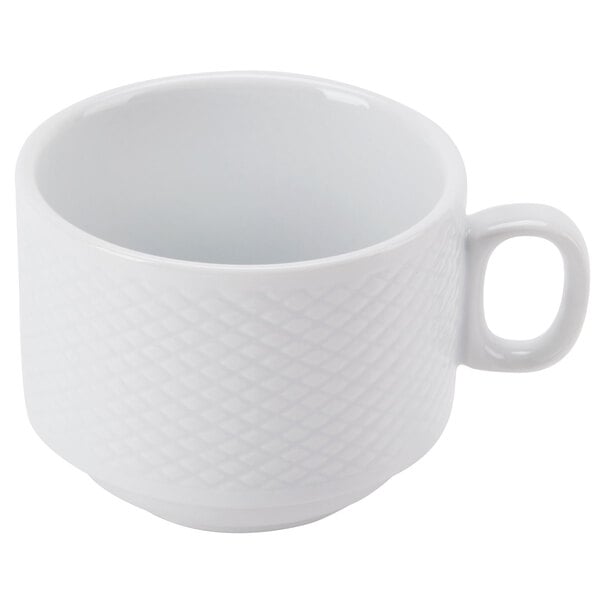 A white coffee cup with a handle.