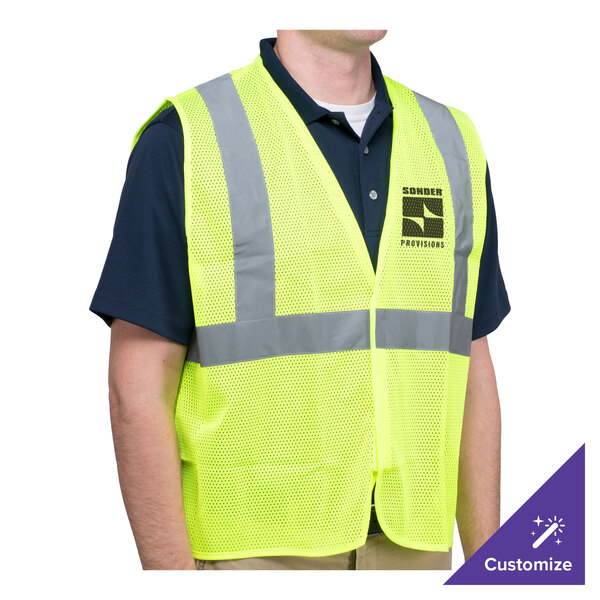 A man wearing a lime green Cordova high visibility safety vest with reflective stripes.