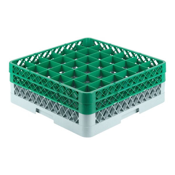 A grey plastic glass rack with green and white extenders.