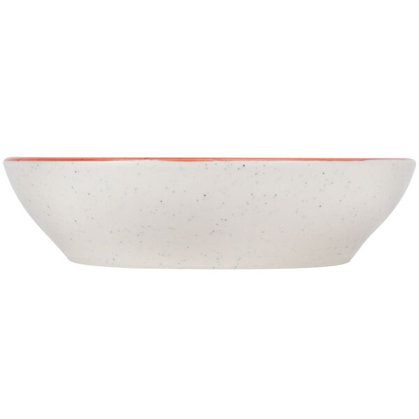 A white bowl with a red rim.