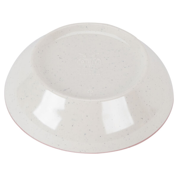 A white bowl with speckled edges.