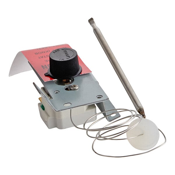 A metal thermostat assembly with a black control knob, a coiled wire, and a metal probe attached.