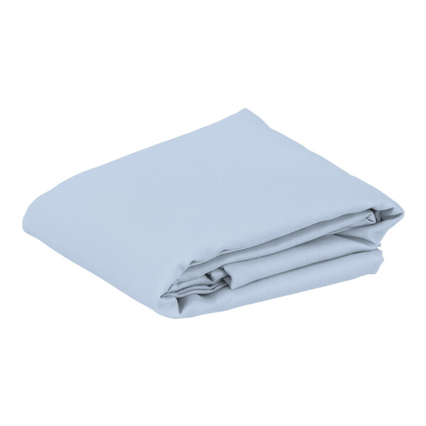 A folded light blue rectangular Intedge table cover.