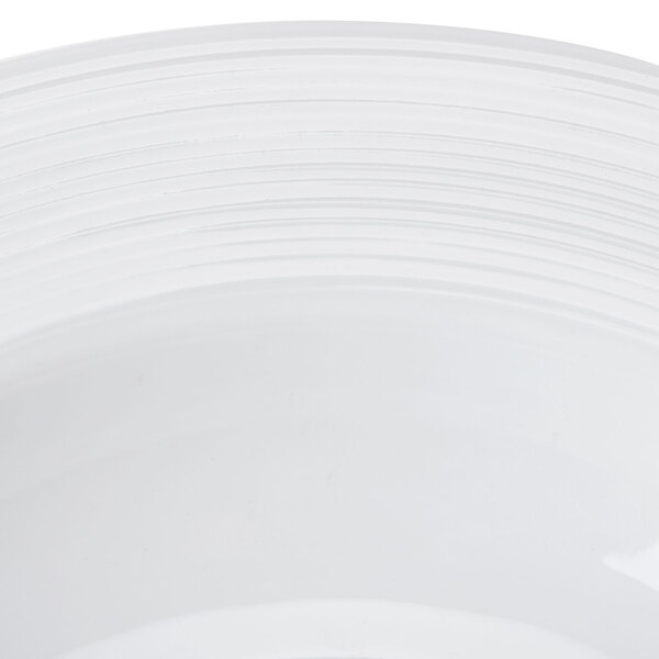 A CAC Harmony white porcelain soup bowl with a white rim.
