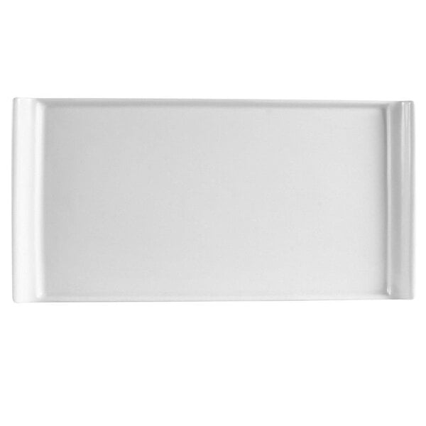 A white rectangular porcelain platter with a black border.