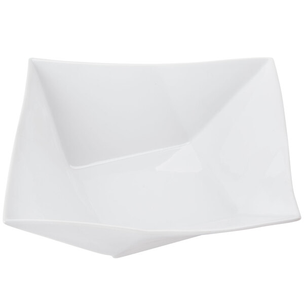 A CAC bright white square porcelain bowl with a curved edge.