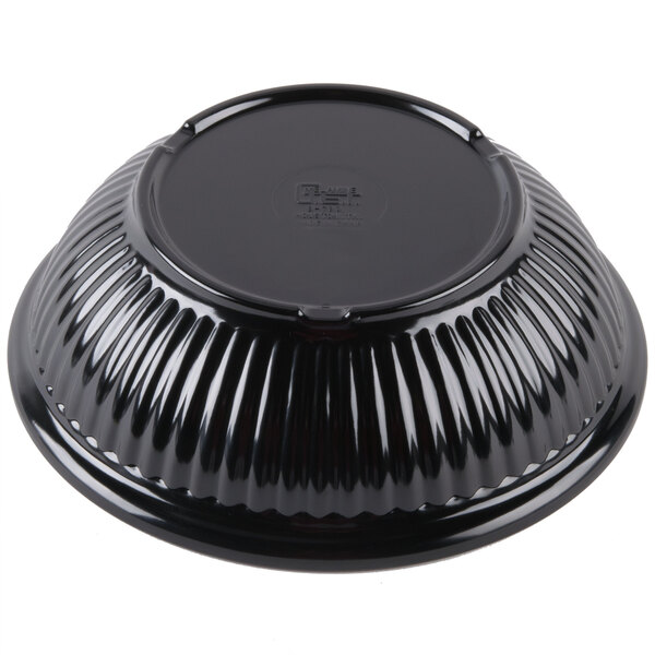 A black bowl with a round lid.