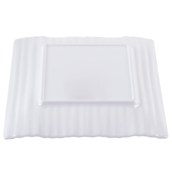 A white square plate with a white border.