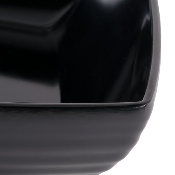 A close up of a black GET Milano square bowl.