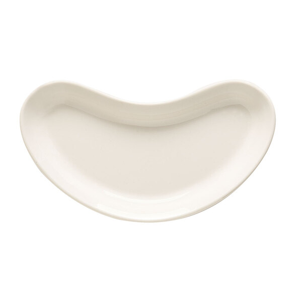 A close up of a white GET curved side dish with a curved edge.