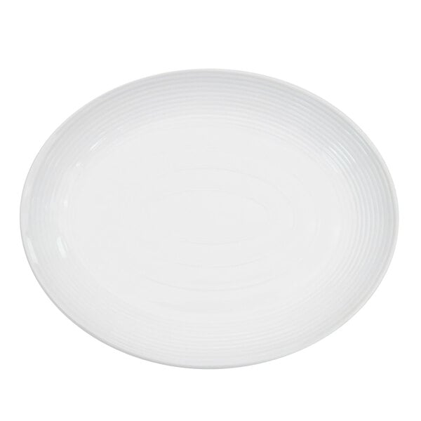 A white porcelain platter with a thin rim.