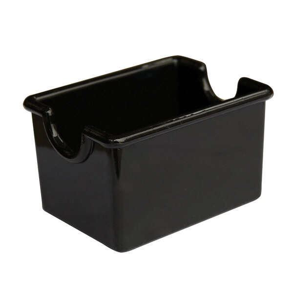 A black plastic GET sugar caddy with a handle.