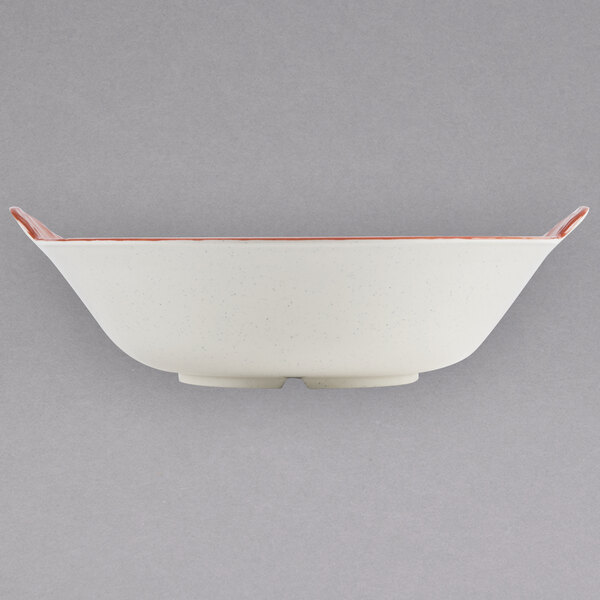 A white rectangular GET Bella Fresco bowl with red trim.