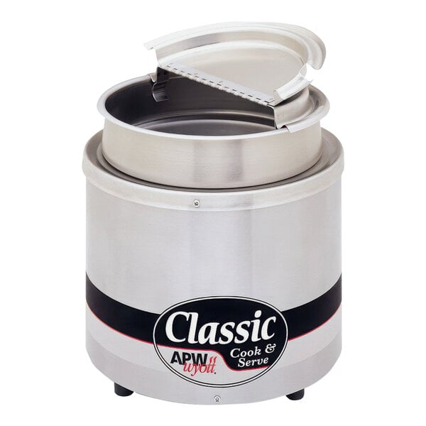 An APW Wyott stainless steel round food warmer with a lid.