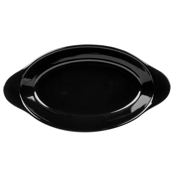 A black oval side dish with handles.