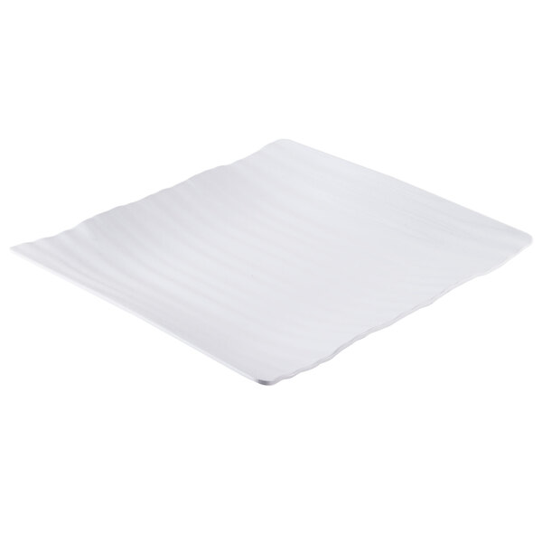 A white rectangular plate with a wavy edge.