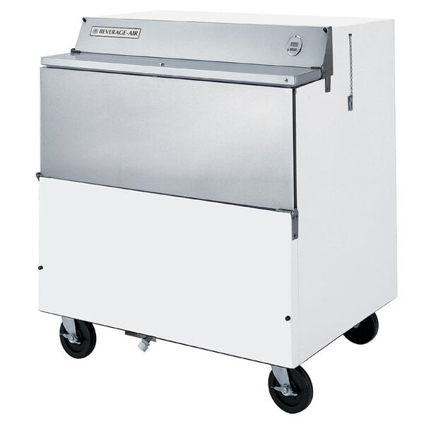 A white Beverage-Air milk cooler with stainless steel interior and wheels.