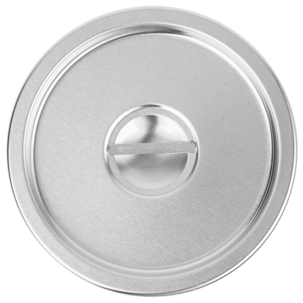 A Vollrath stainless steel lid with a metal handle.