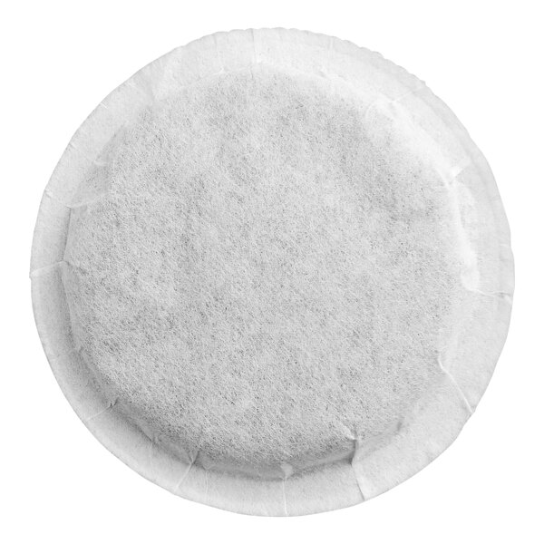 A round, white, fabric-like tea pod with a stitched edge, viewed from above.