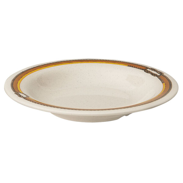 A white bowl with a gold rim.