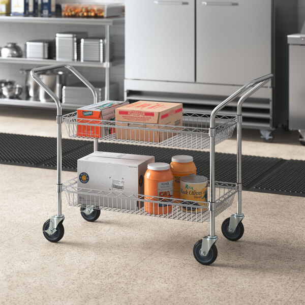 A Regency chrome utility cart with food on it.