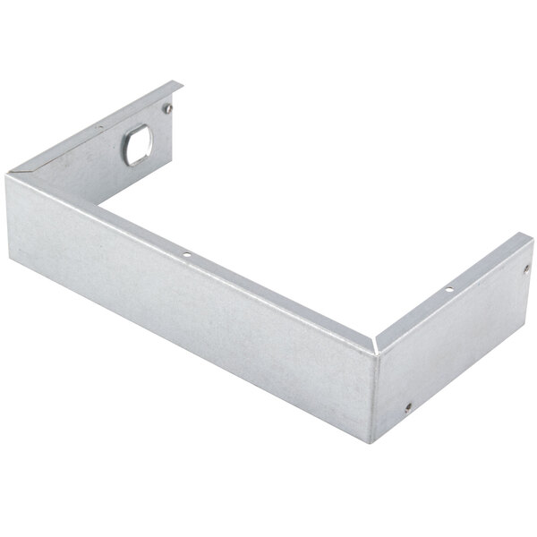 The metal corner of a Waring Power Box with holes.