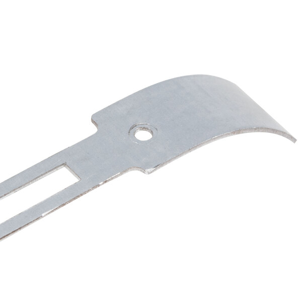 A silver metal Waring toaster housing support with a hole.