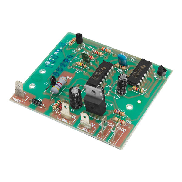 A green circuit board with black and grey components.