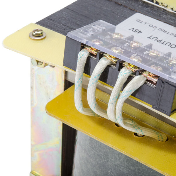 A close-up of an ARY VacMaster sealing transformer with wires attached.