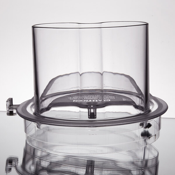 A clear plastic container with a black lid.