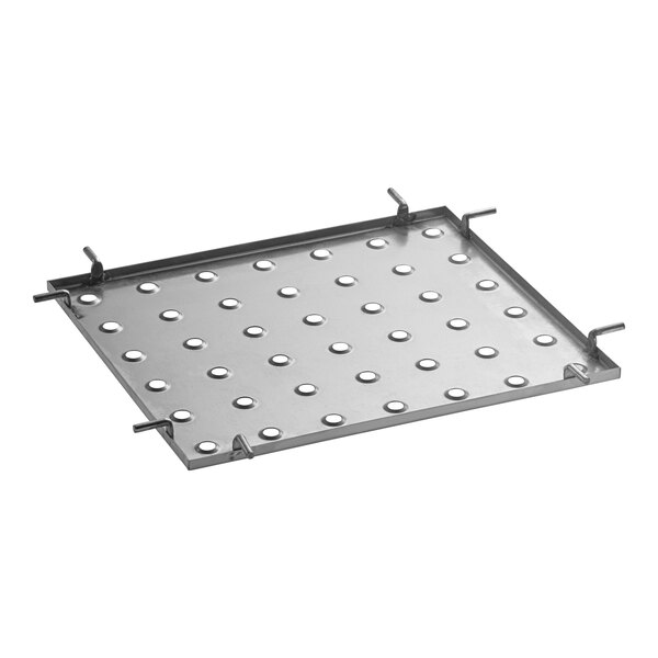 A metal plate with holes for chicken or fish.