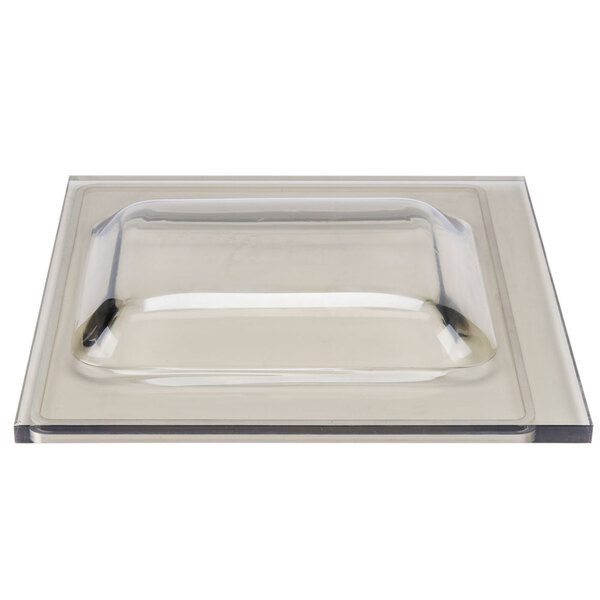 A clear plastic rectangular lid with a white border.