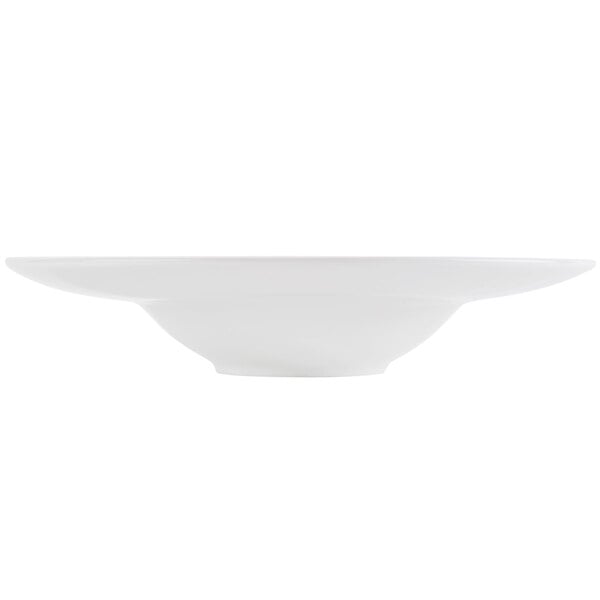 A CAC Paris bone white porcelain soup bowl with a white background.