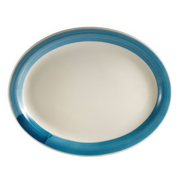 A blue and white narrow rim platter with an oval shape.