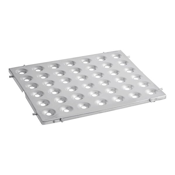 A metal plate with holes designed for chicken and fish.