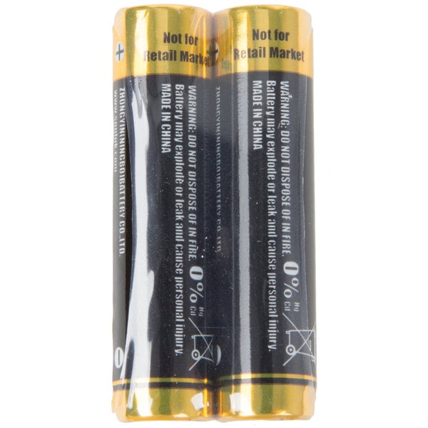 A close-up of a black and white label on a battery wrapper.