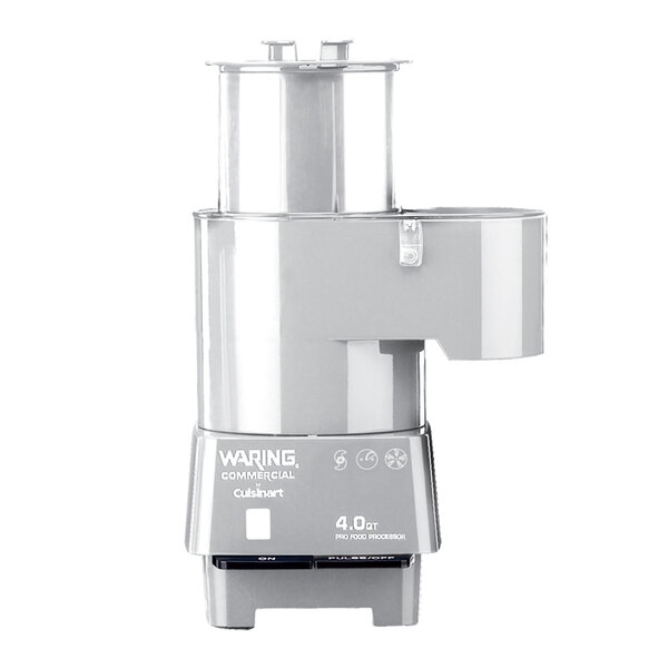 A close-up of a Waring food processor with a silver lid on top.
