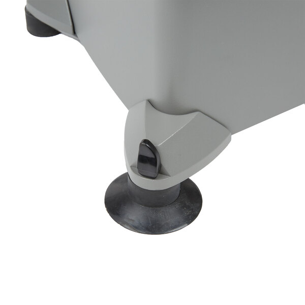 A Waring suction cup foot in a grey box.