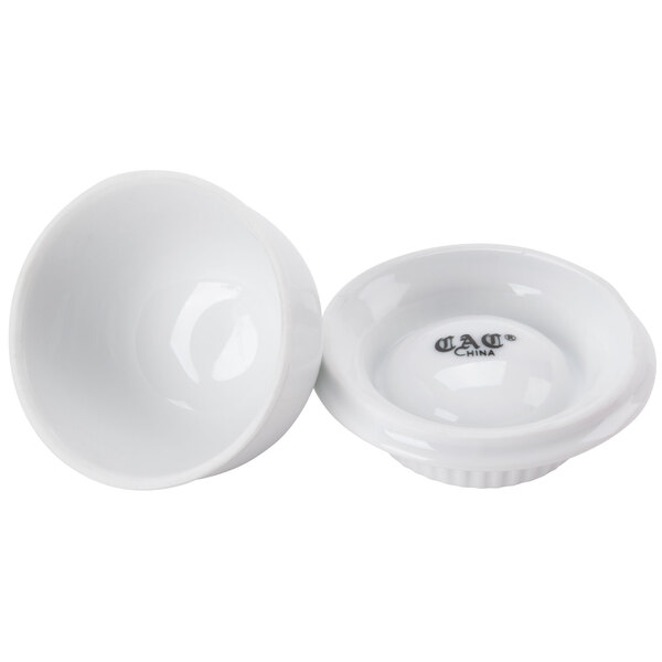 A close-up of a white bowl with a logo on it.