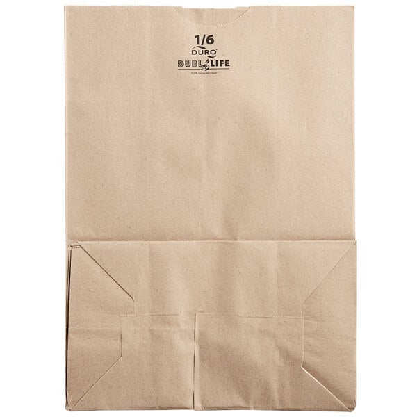 A bundle of 400 brown Bagcraft barrel sack bags.