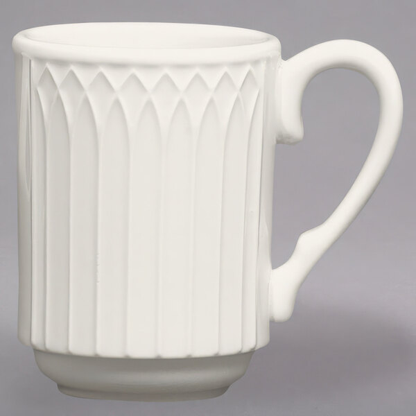 A Homer Laughlin ivory china mug with a curved handle and white rim.