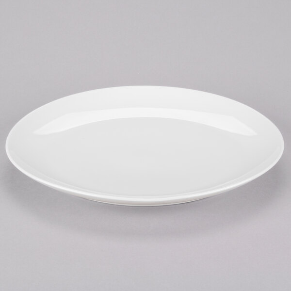 A white Homer Laughlin china platter with a rim.