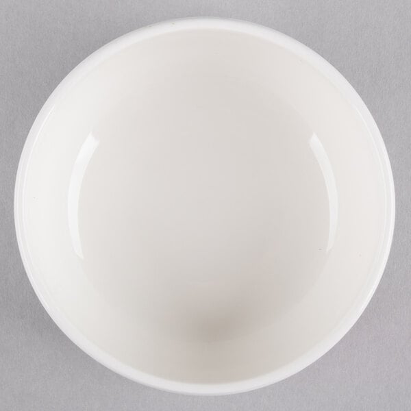 A Homer Laughlin Ameriwhite Alexa china bowl on a gray background.