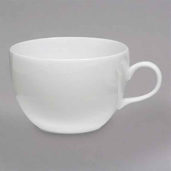 A Homer Laughlin bright white china cup with a handle.