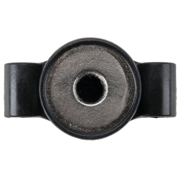 A black metal Waring polishing wheel end cap with a hole in the middle.