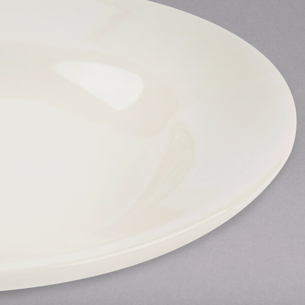 A Homer Laughlin ivory china bowl with a rolled white rim.