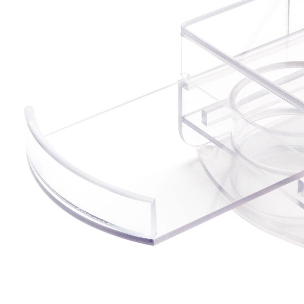 A clear plastic Cal-Mil cylinder bin with a clear lid.